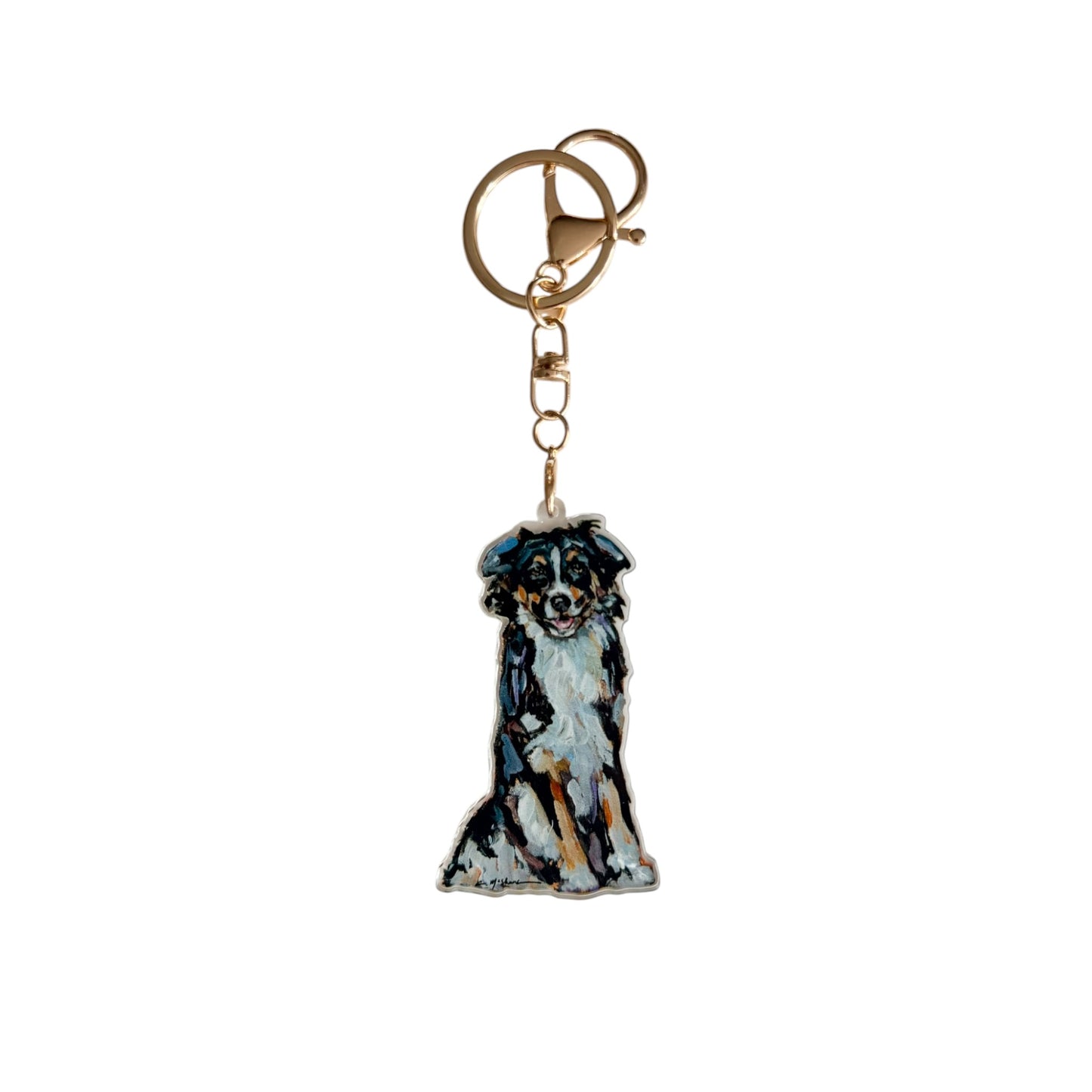 Tri Color Australian Shepherd acrylic dog bag charm and keychain featuring artwork by Chelsea McShane.
