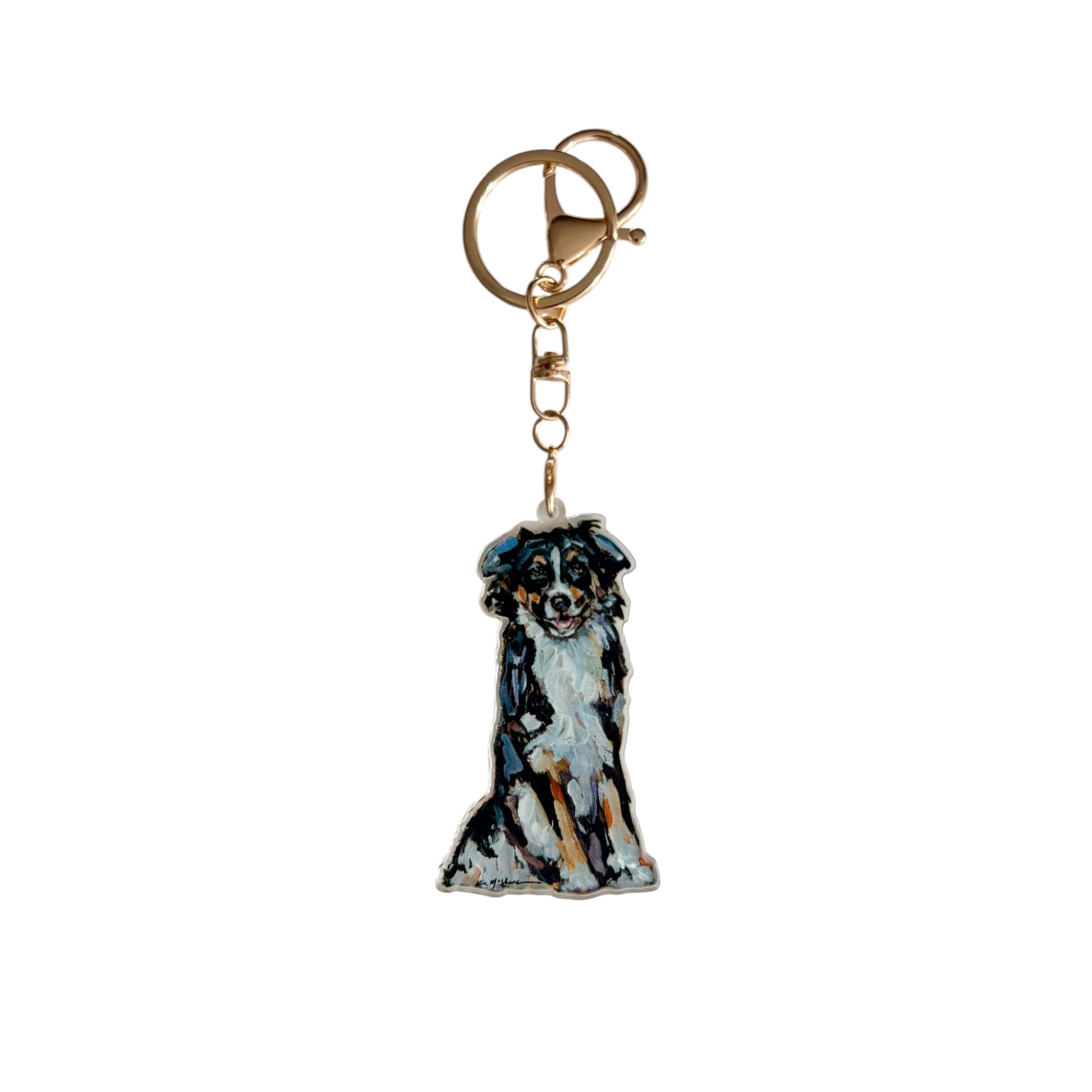 Tri Color Australian Shepherd acrylic dog bag charm and keychain featuring artwork by Chelsea McShane.
