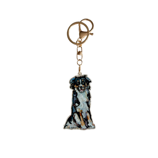 Tri Color Australian Shepherd acrylic dog bag charm and keychain featuring artwork by Chelsea McShane.