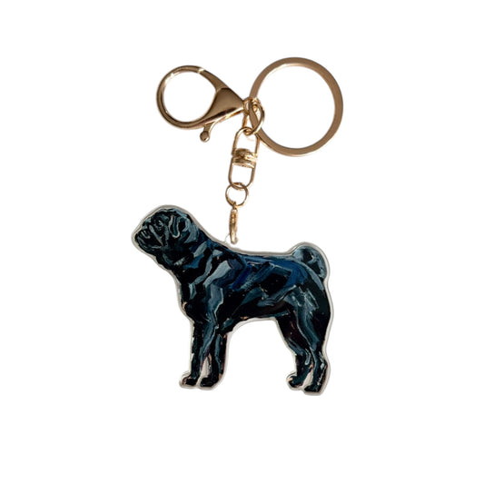 Black Pug acrylic dog bag charm and keychain featuring artwork by Chelsea McShane.