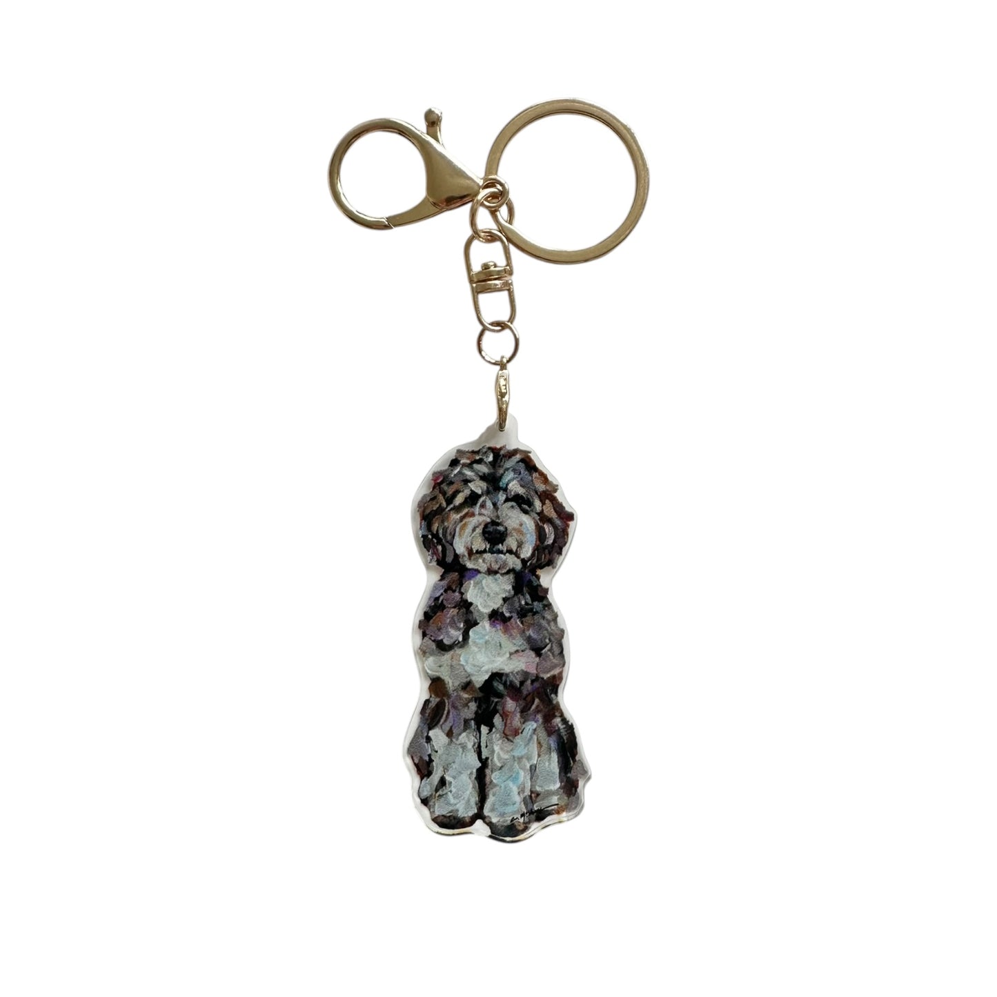 Bernedoodle acrylic dog bag charm and keychain featuring artwork by Chelsea McShane.