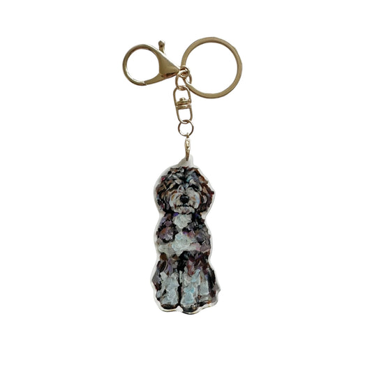 Bernedoodle acrylic dog bag charm and keychain featuring artwork by Chelsea McShane.